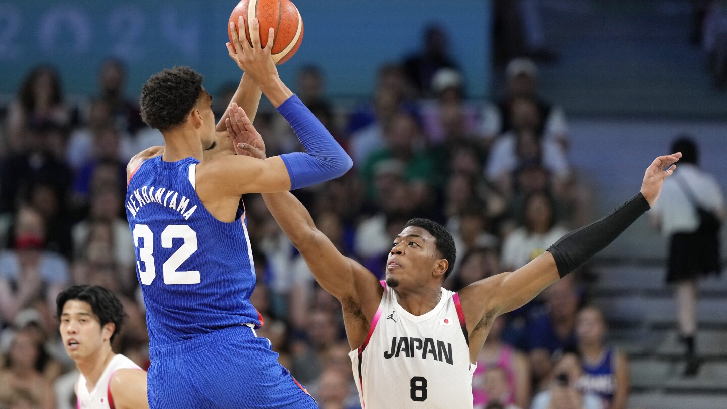 Wembanyama takes over in OT, helps France escape a serious challenge from Japan at the Paris Games