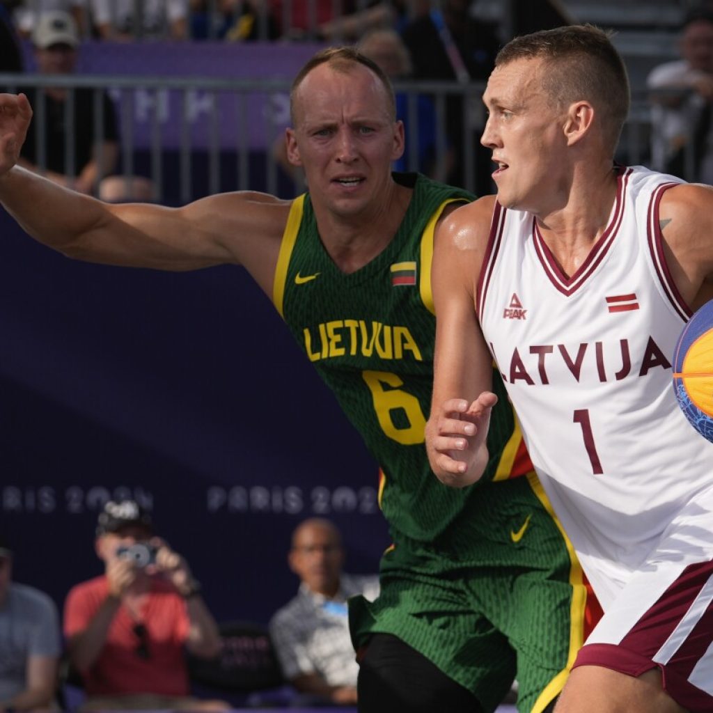 Miezis leads defending champion Latvia to 21-14 win over Lithuania in 3×3 basketball at Paris Games