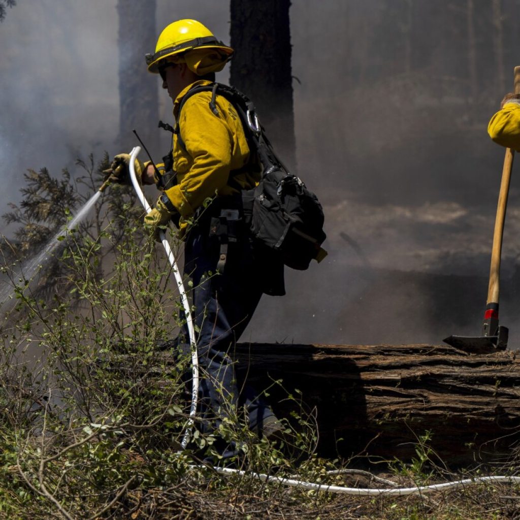 Firefighters make progress against massive blaze in California ahead of warming weather