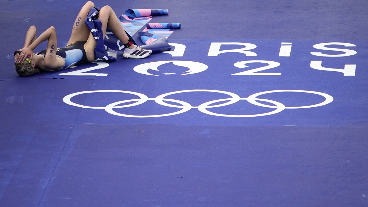 Beaugrand of France wins women’s Olympic triathlon after concerns about water quality in Seine