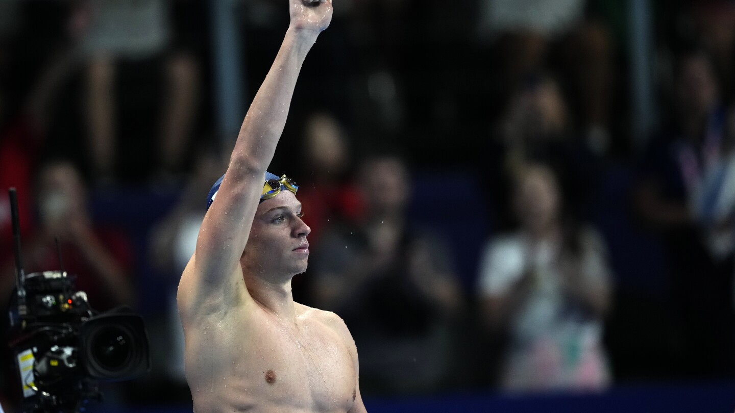 Léon Marchand rallies for a second gold medal, beating Milák in the 200 fly to begin a busy night