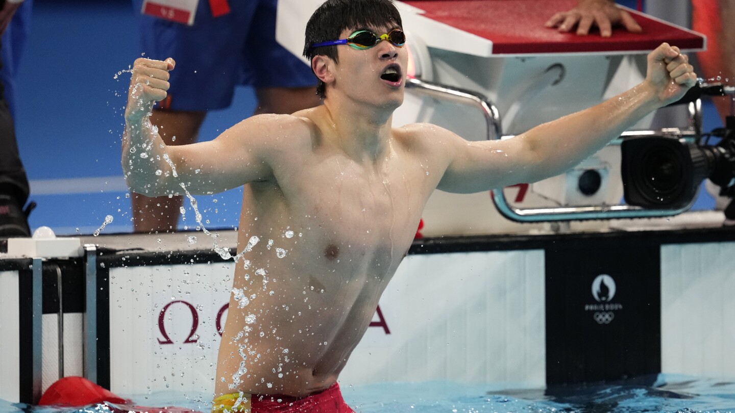 Pan Zhanle of China breaks own world record to win Olympic gold medal in men’s 100-meter freestyle