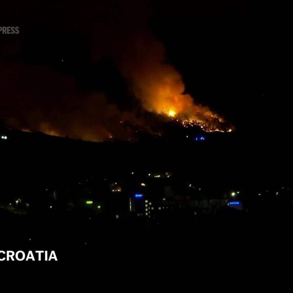 Croatian firefighters battle wildfires along coast in dramatic night | AP News