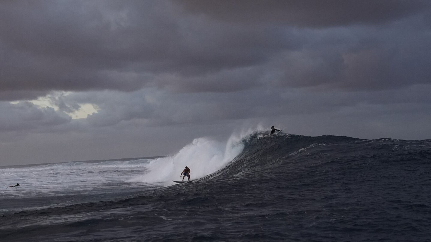 Judge removed from Olympics surfing panel after photo with athlete circulates on social media