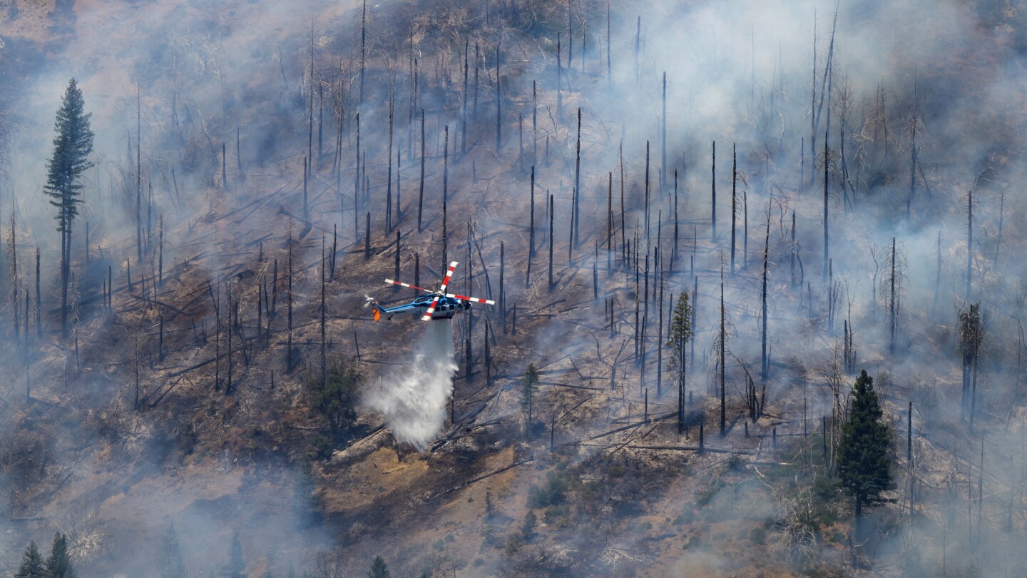 Increasing wind and heat plus risk of thunderstorms expected in fight against California wildfire