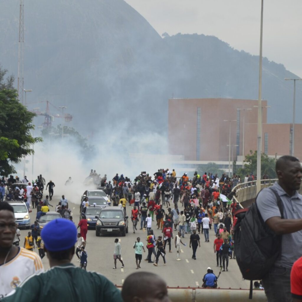 Rights group says 13 killed during protests over Nigeria’s economic crisis. Hundreds arrested