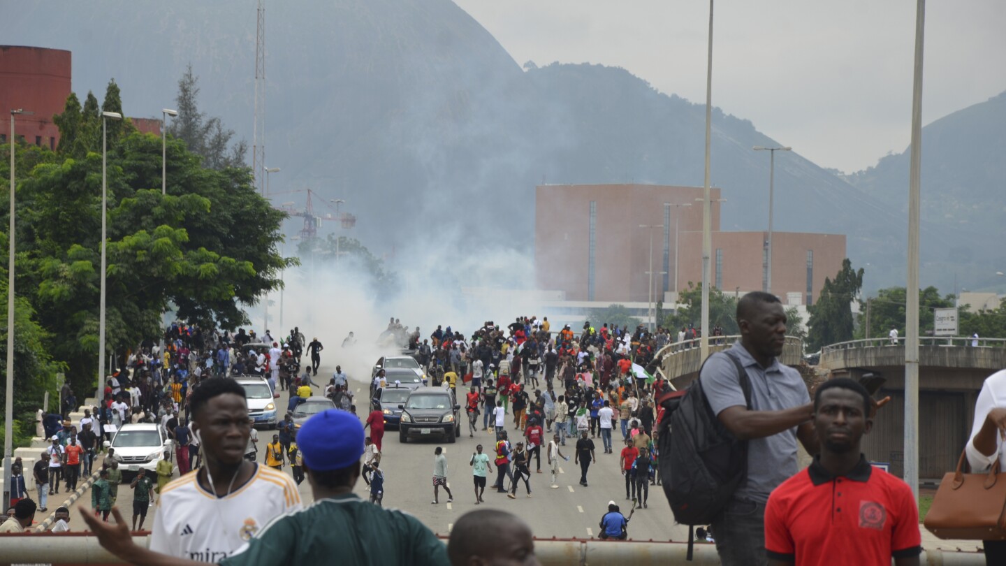 Rights group says 13 killed during protests over Nigeria’s economic crisis. Hundreds arrested