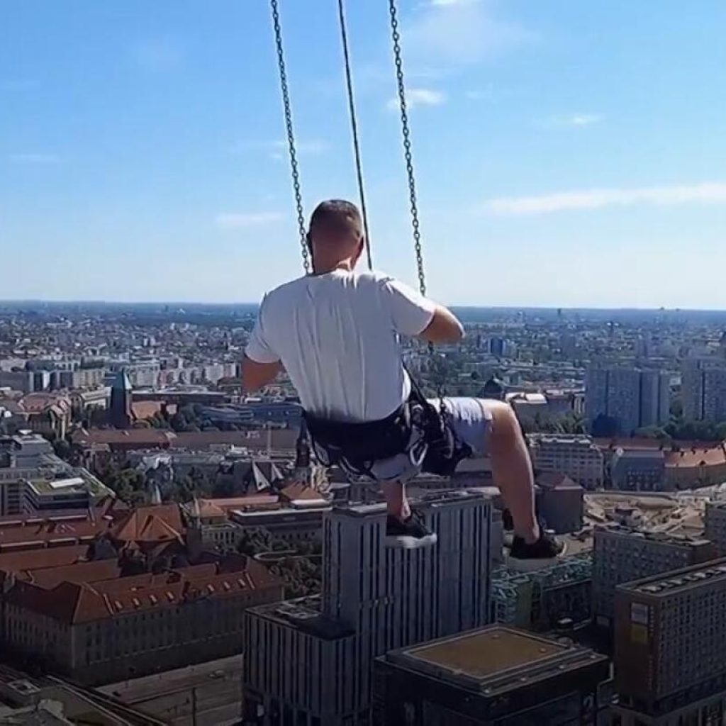 Berlin is offering a new attraction for adrenaline junkies: A high swing 120 meters above the ground | AP News