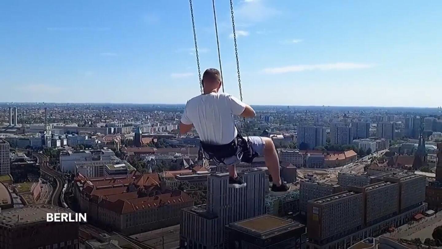 Berlin is offering a new attraction for adrenaline junkies: A high swing 120 meters above the ground | AP News