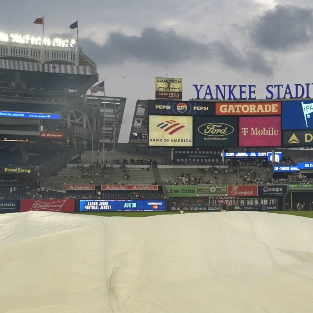 Some Yankee Stadium bleachers fans chant `U-S-A!’ during `O Canada’ before game against Blue Jays