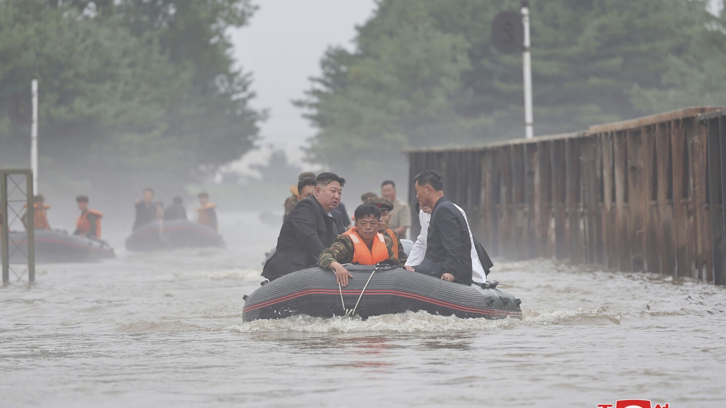 North Korean leader accuses South Korea of a smear campaign over floods and hints at rejecting aid