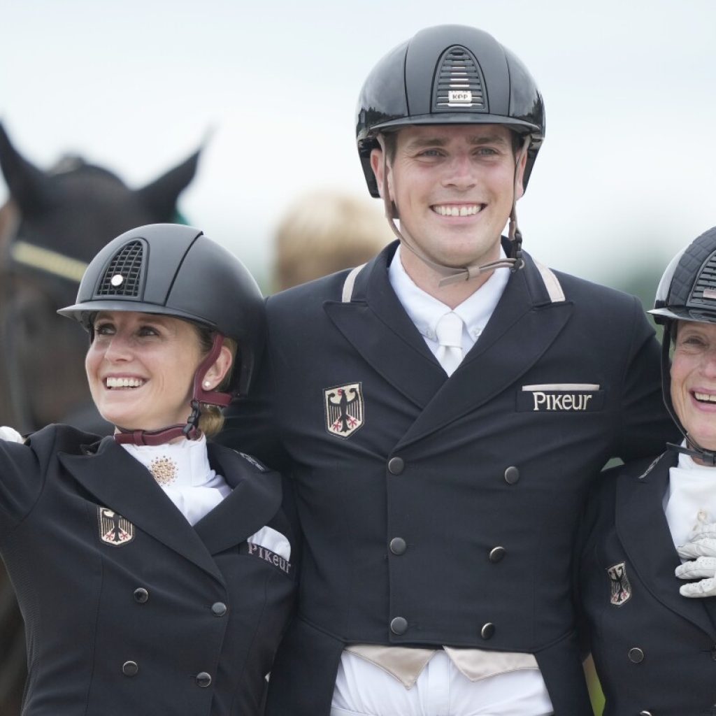 Germany edges Denmark to win a third straight Olympic team dressage title