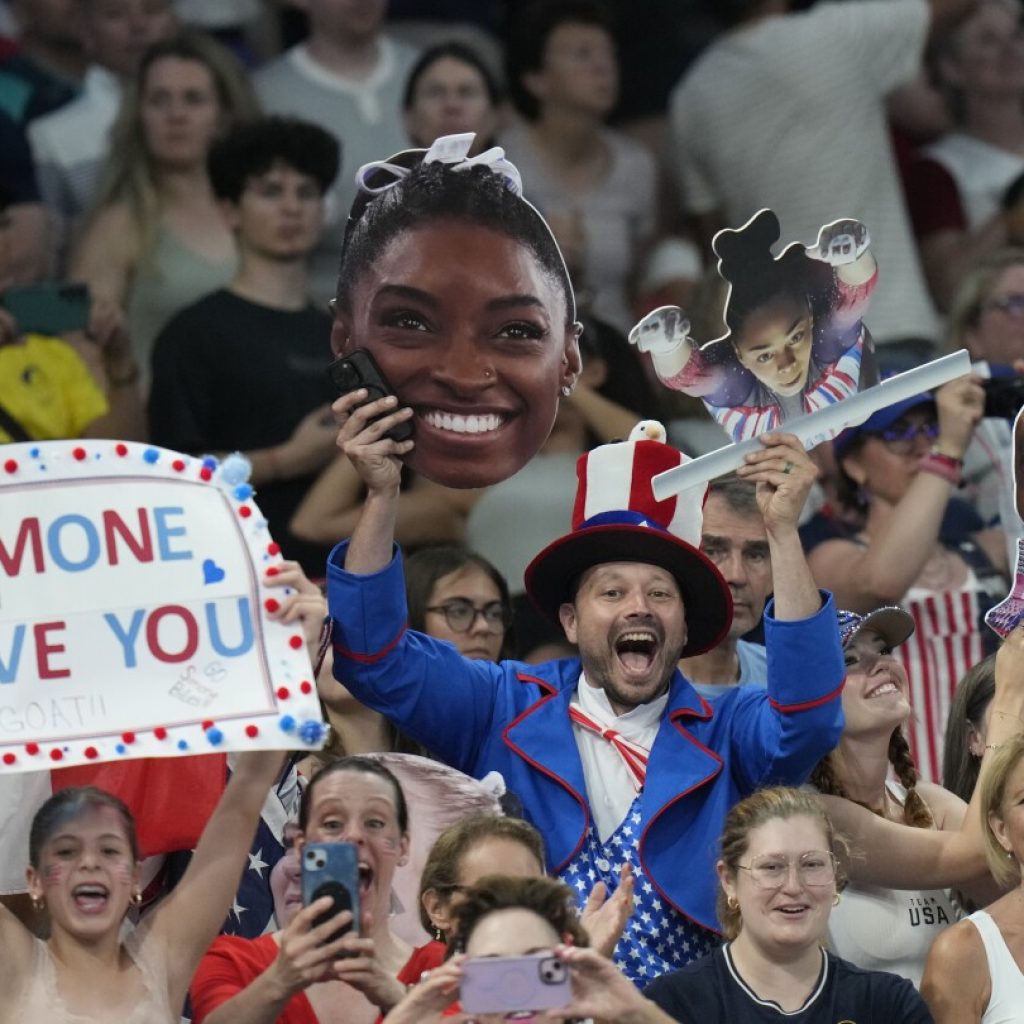 Fans are making a big deal out of their favorite Olympians with large, easy-to-see cutouts