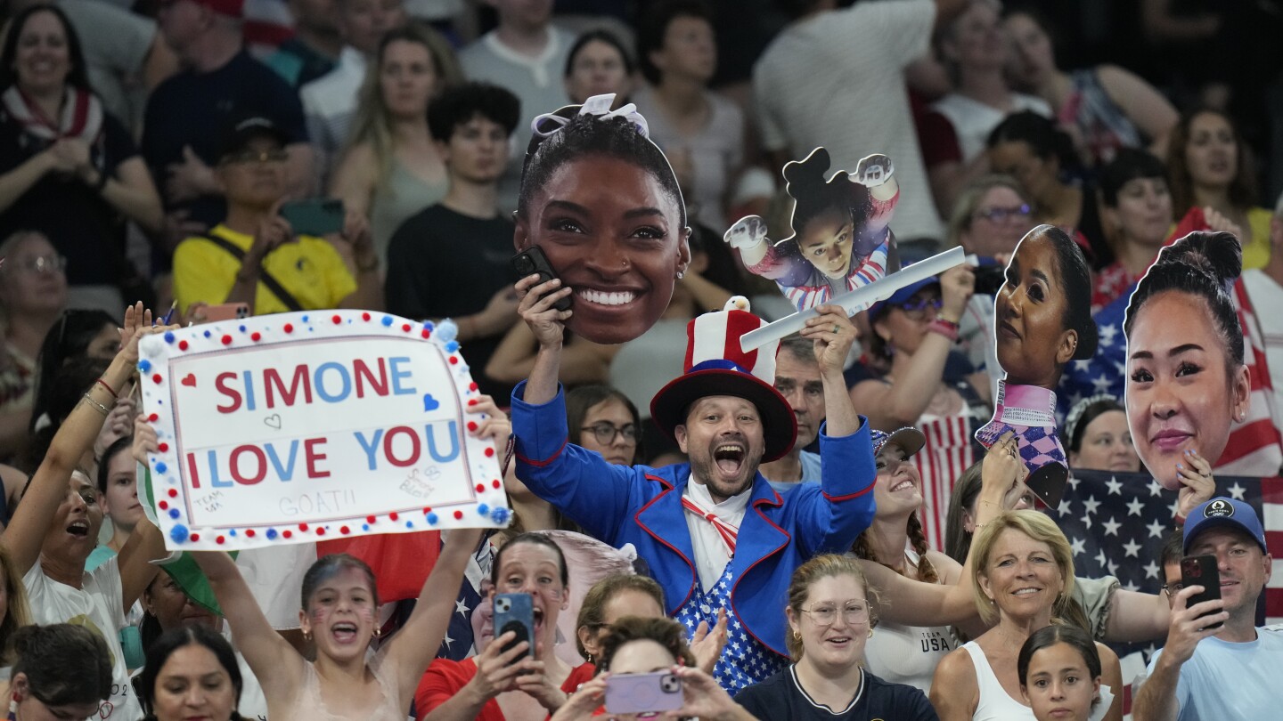 Fans are making a big deal out of their favorite Olympians with large, easy-to-see cutouts