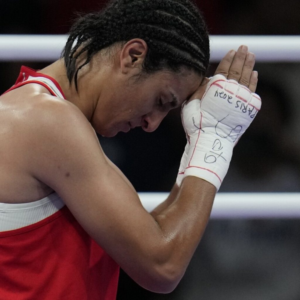 Olympic fans cheer on Imane Khelif during win after she faced days of online abuse