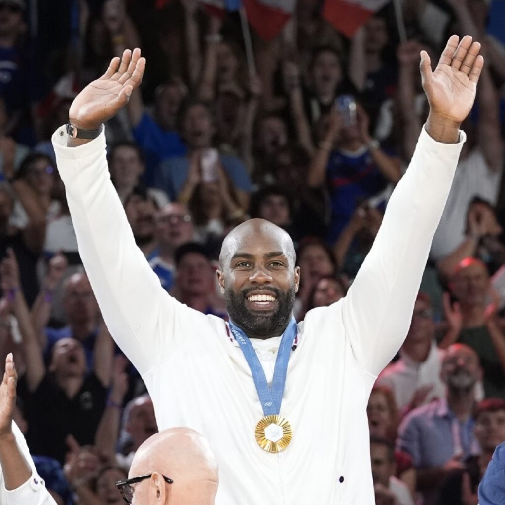 Teddy Riner stars again as France defends its Olympic title in mixed team judo, beating Japan final