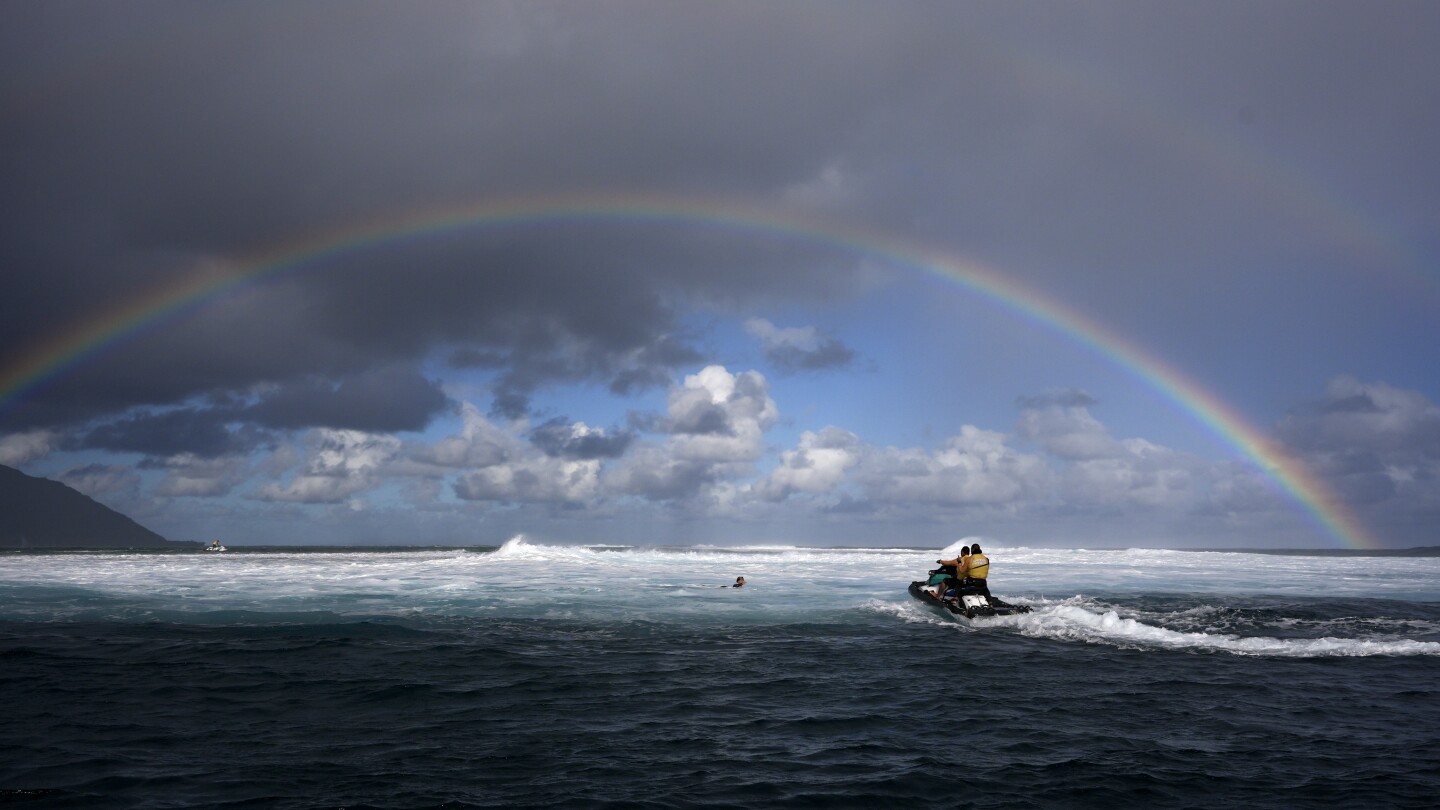 Paris Olympics water safety patrol ‘like guardian angels’ during surfing competition in Tahiti