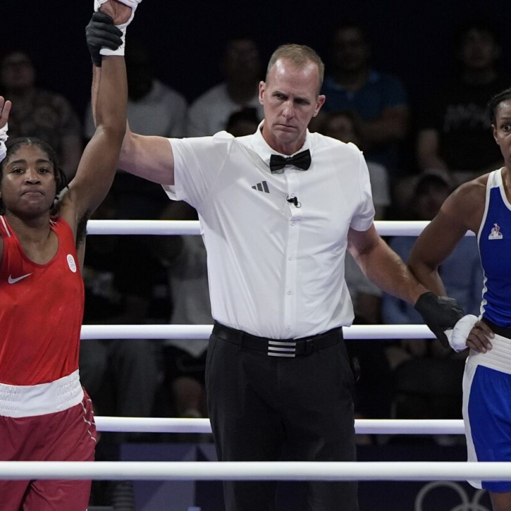 Boxer Cindy Ngamba is the refugee team’s first athlete to clinch a medal at the Paris Olympics