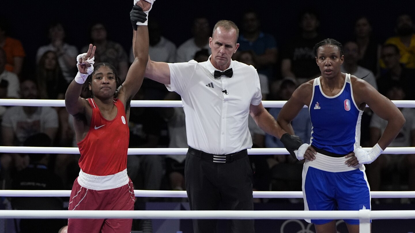 Boxer Cindy Ngamba is the refugee team’s first athlete to clinch a medal at the Paris Olympics