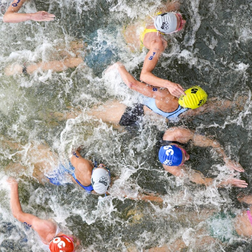 Belgium withdraws from mixed relay triathlon after athlete who swam in Seine River falls ill