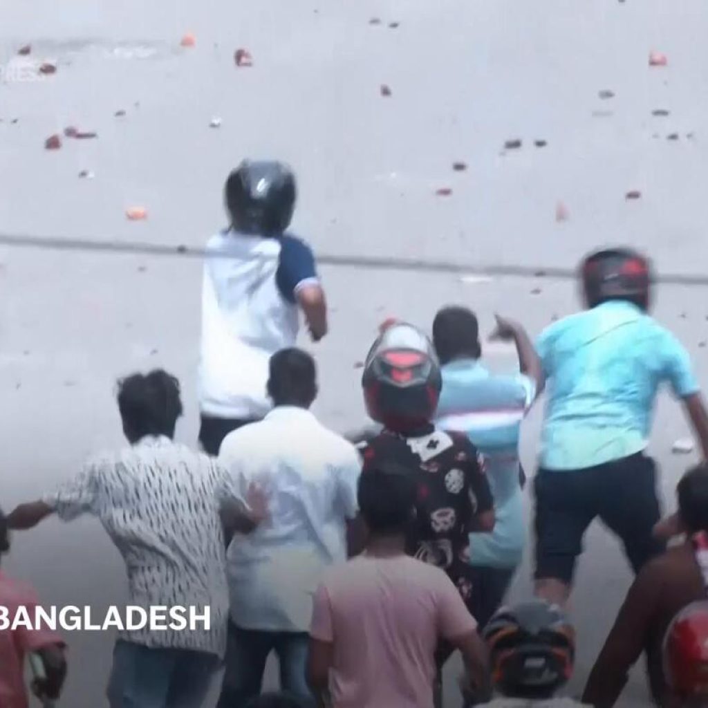 Violence in Bangladesh leaves many people dead, hundreds injured as protests continue | AP News