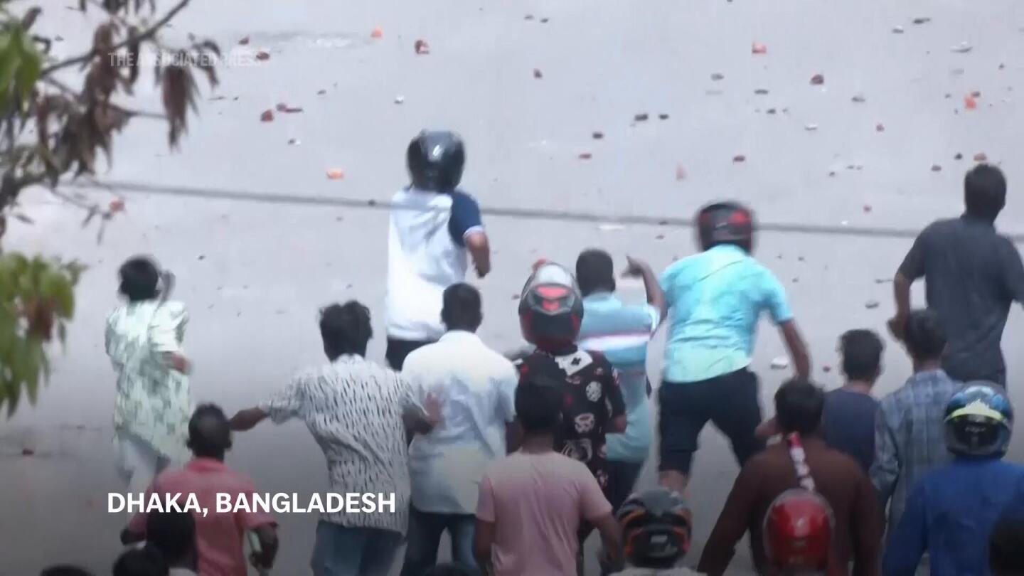 Violence in Bangladesh leaves many people dead, hundreds injured as protests continue | AP News