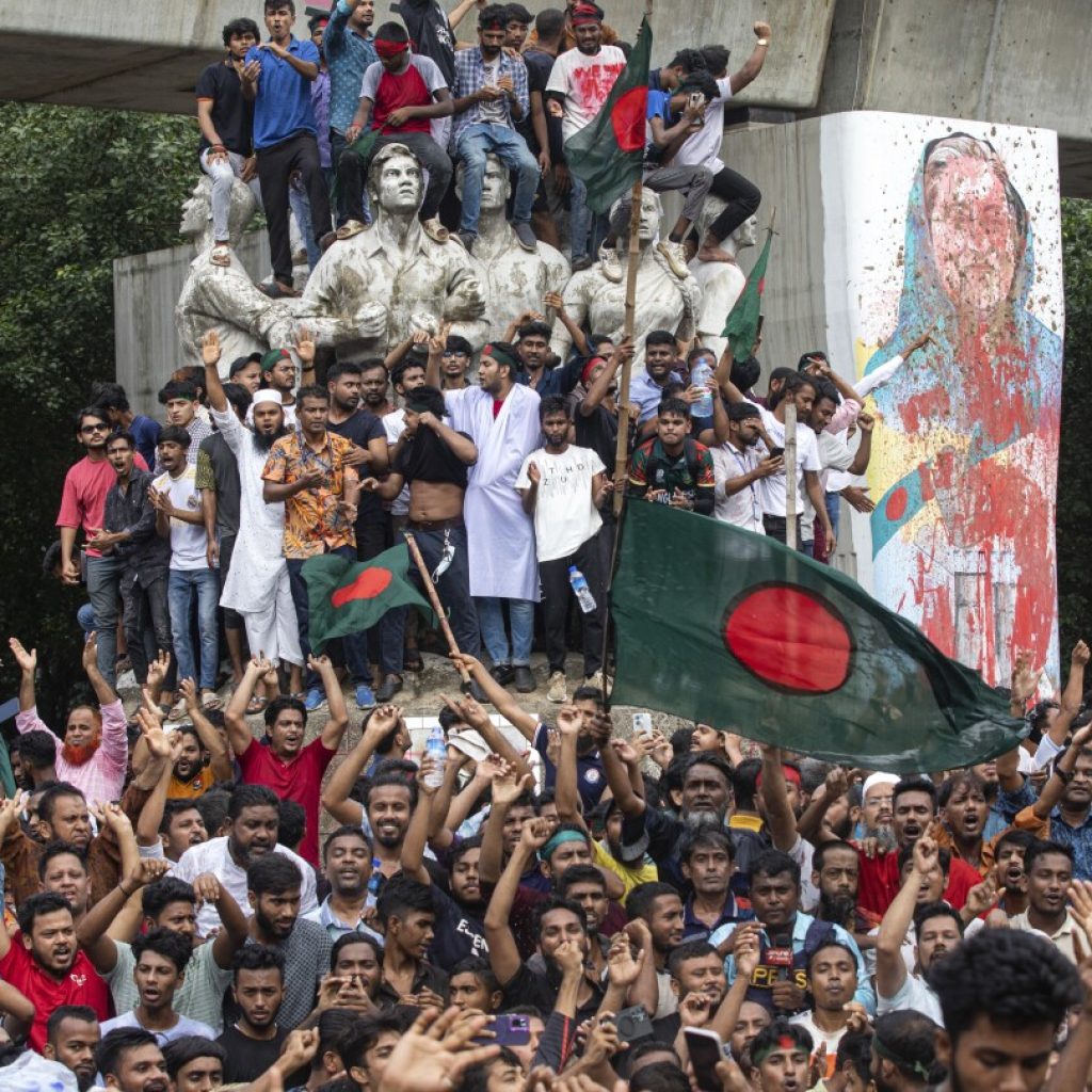 Bangladesh protesters celebrate as longtime prime minister steps down and flees abroad