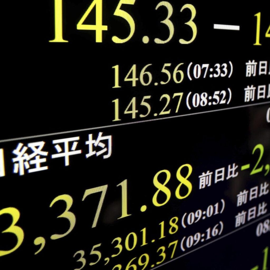 Japan’s benchmark Nikkei 225 index soars more than 10% after plunging a day earlier