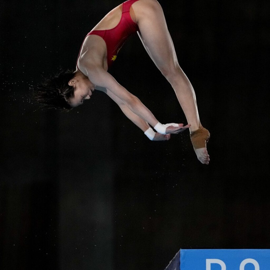 Quan Hongchan of China wins gold on 10-meter platform with Chen Yuxi taking silver in Paris Olympics