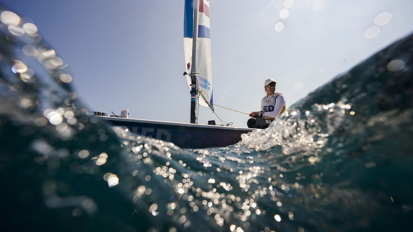 Fickle winds scuttle medal races again, now in the biggest, most diverse Olympic sailing class