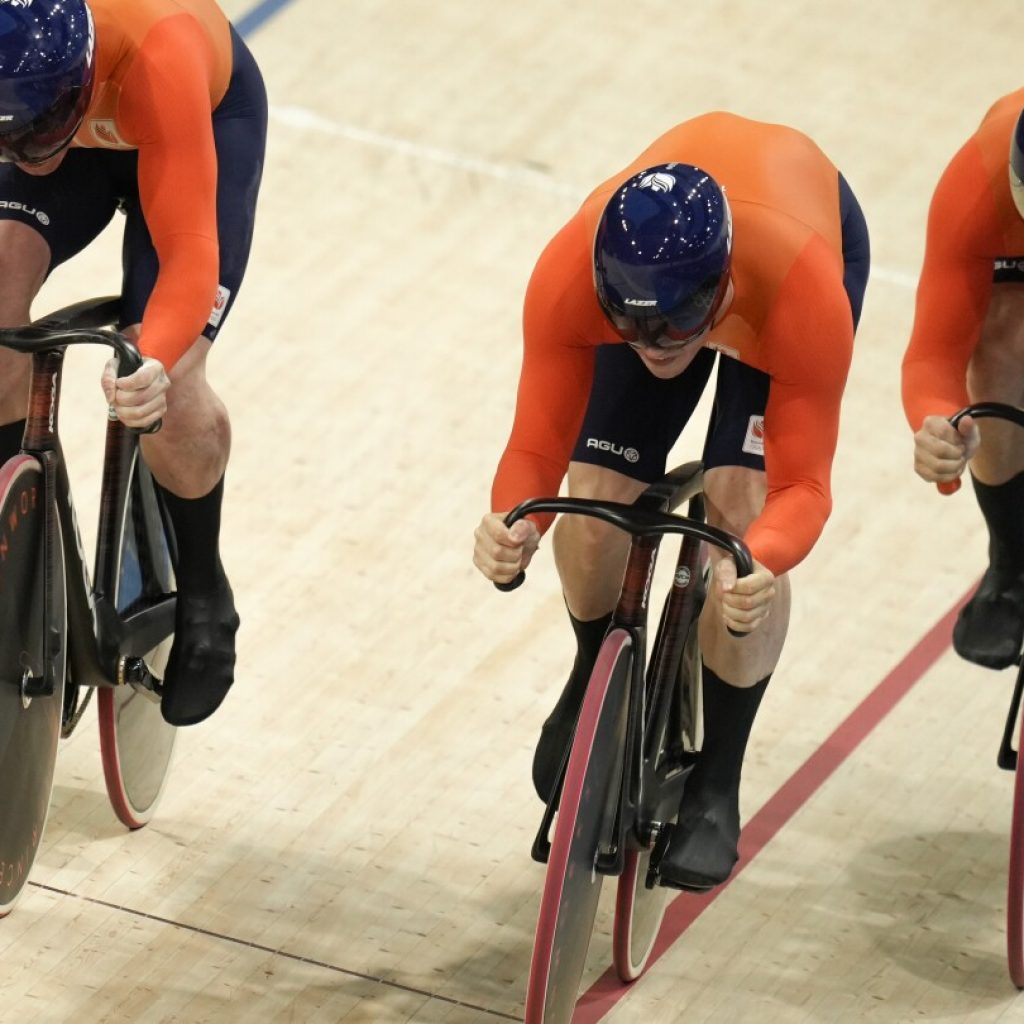 Dutch trio of van den Berg, Lavreysen and Hoogland beat British to defend Olympic team sprint title