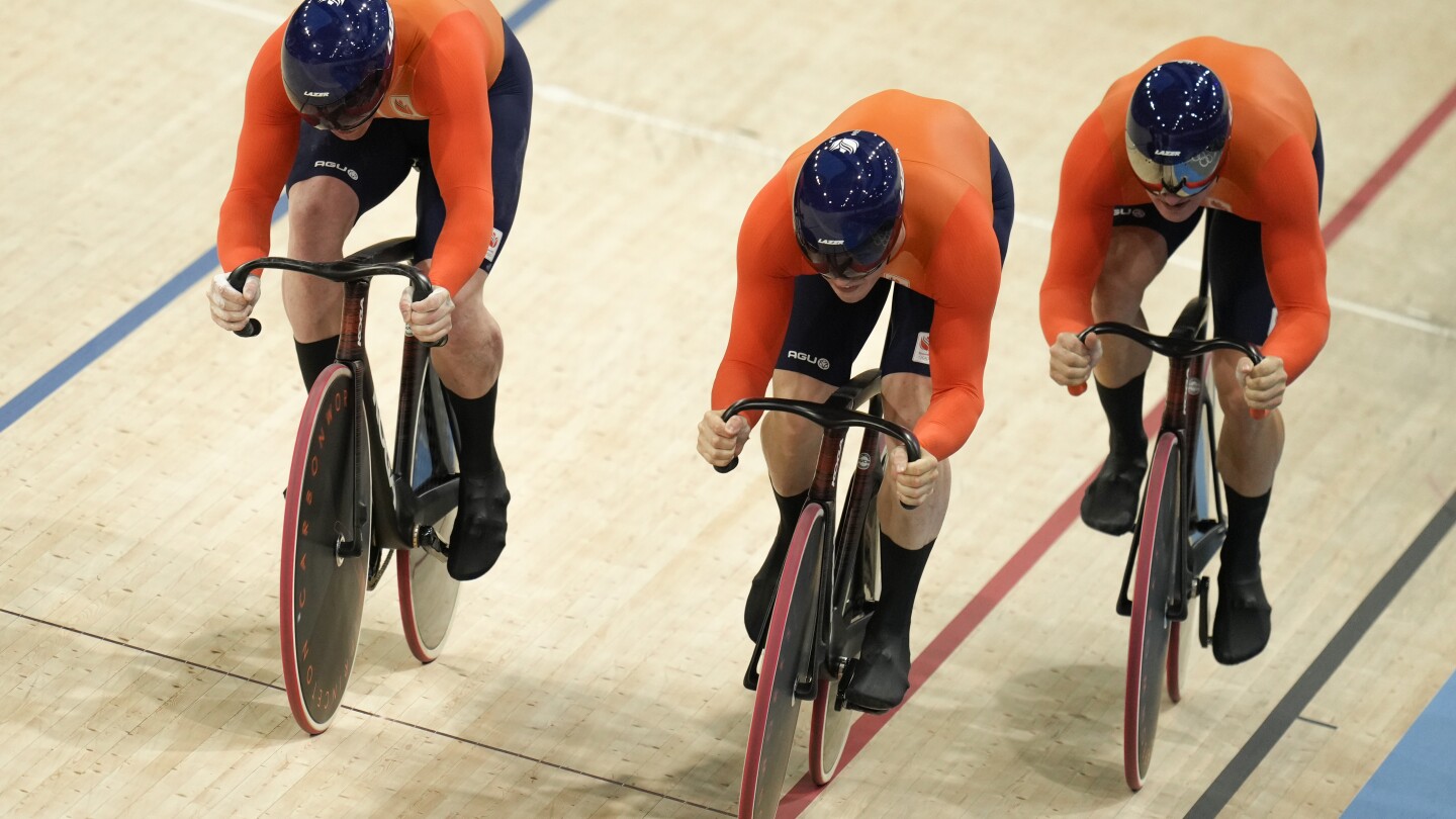 Dutch trio of van den Berg, Lavreysen and Hoogland beat British to defend Olympic team sprint title