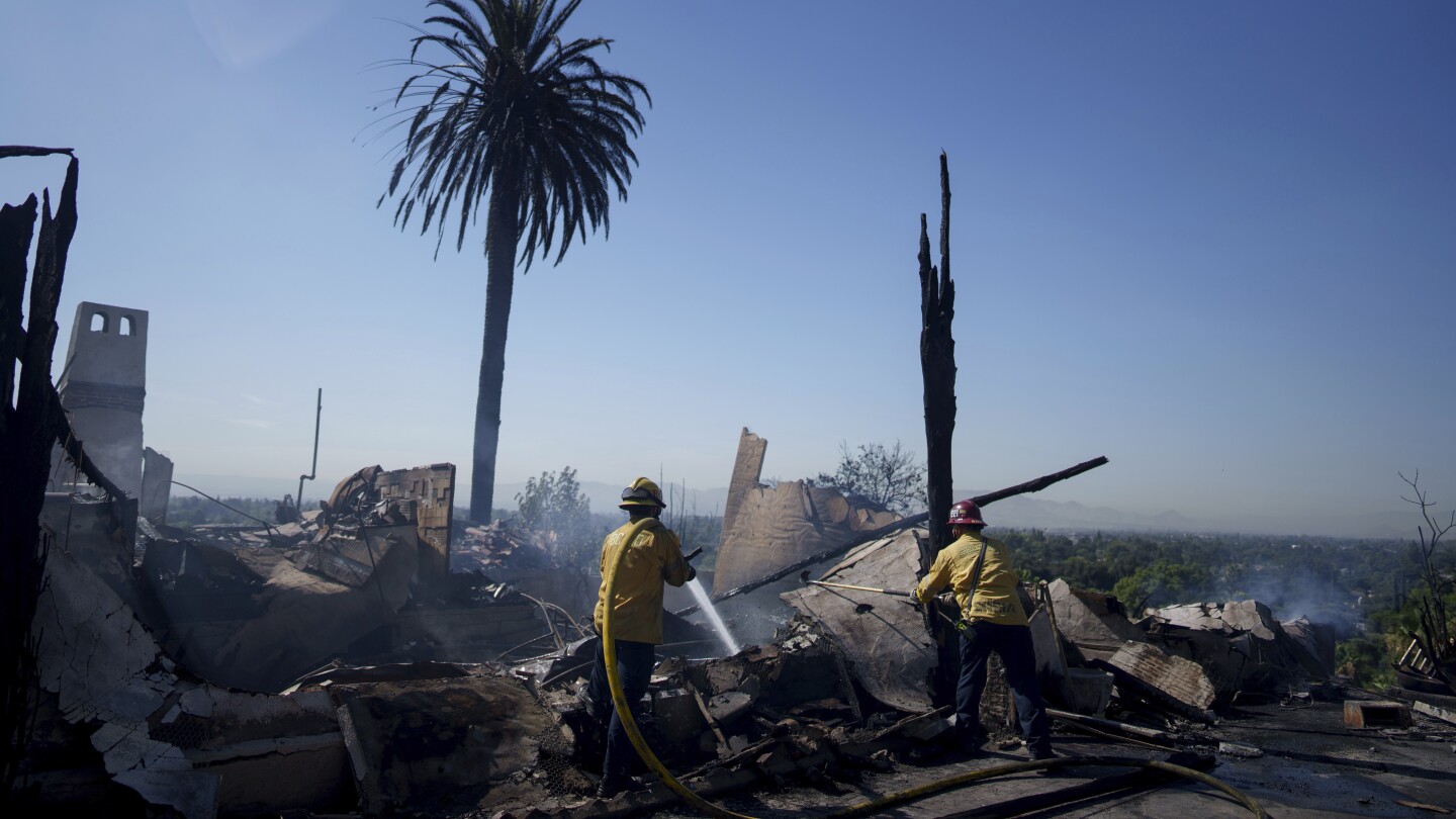 Fast-moving Southern California wildfire torches hillside homes, forcing evacuations