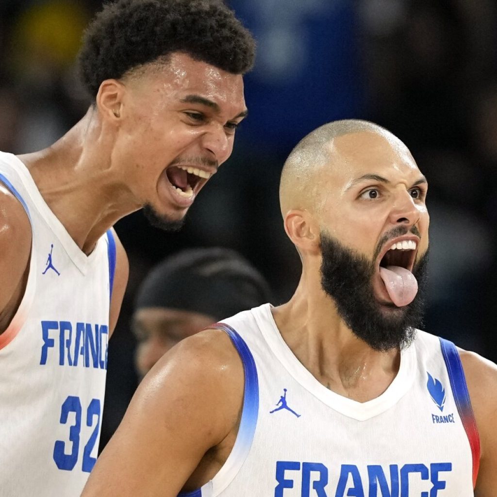 France tops Canada and Serbia beats Australia in OT to reach Olympic semis. Germany also advances