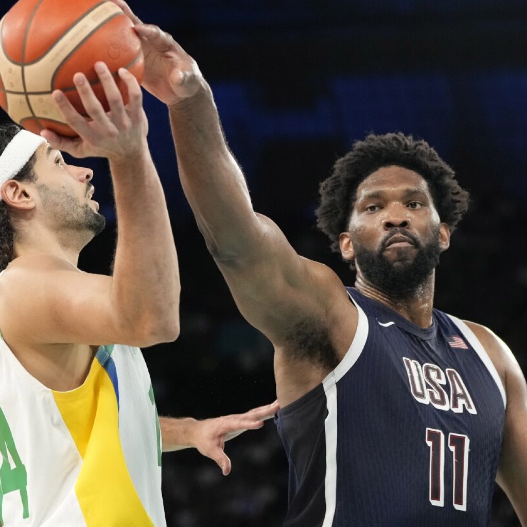 US rolls into semifinals of Paris Olympic basketball tournament, eases past Brazil 122-87