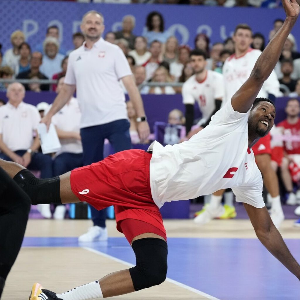 Poland rallies to beat the US in men’s volleyball in fifth set and will play for Olympic gold