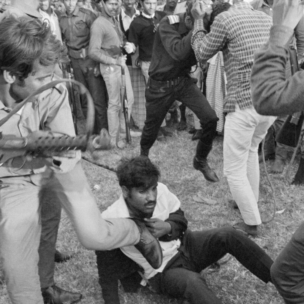 AP PHOTOS: Bangladesh’s turbulent half-century, from coups to climate shocks