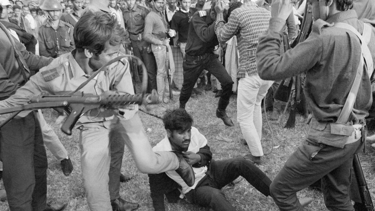 AP PHOTOS: Bangladesh’s turbulent half-century, from coups to climate shocks