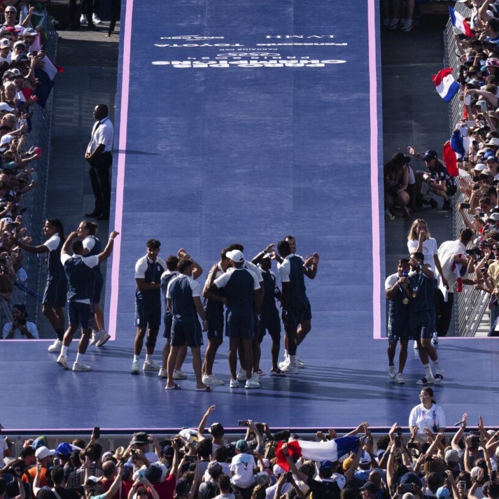 Athletes stick around Paris Games to watch other sports and get the full Olympic experience