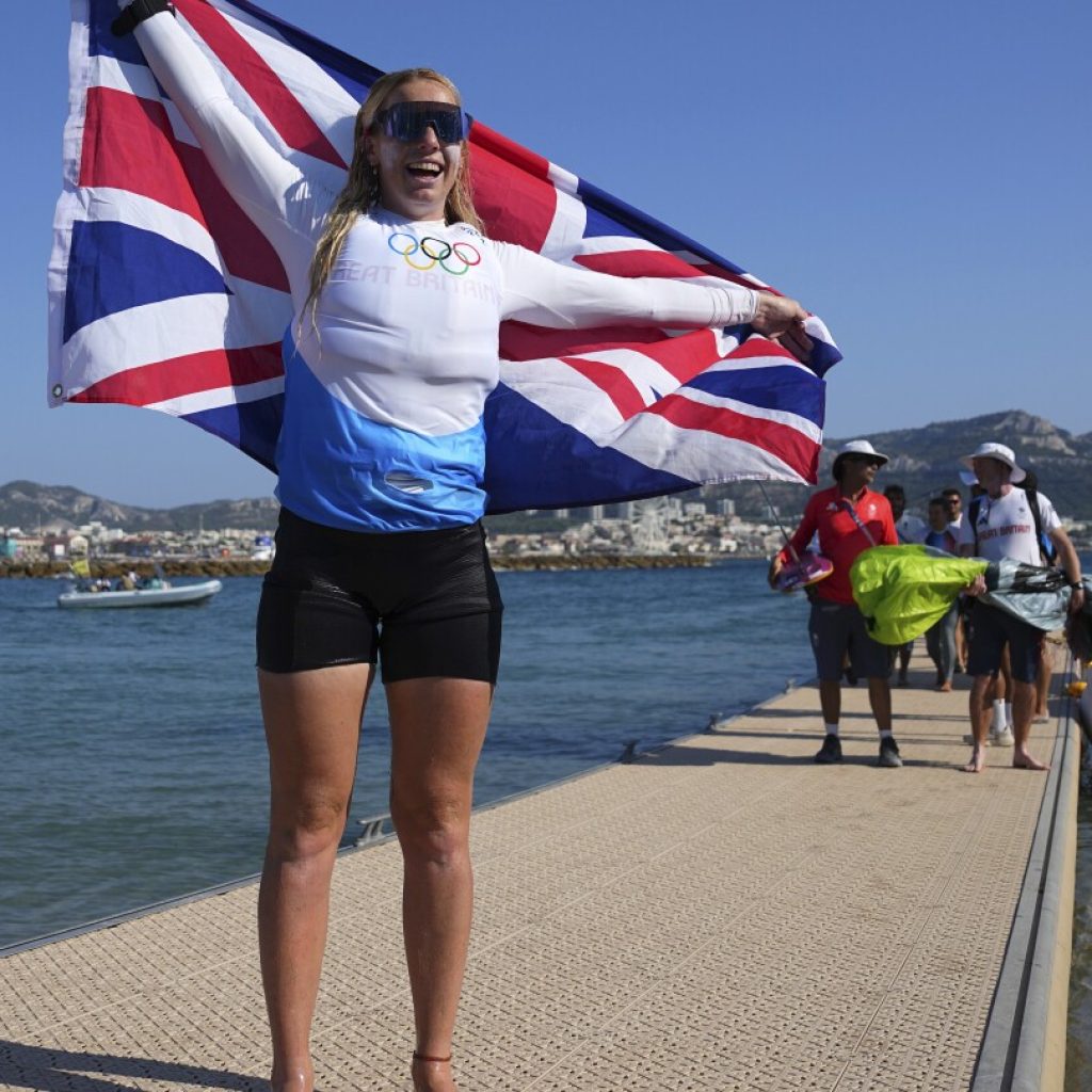 Britain’s Ellie Aldridge wins the first gold in kitesurfing, billed as the fastest Olympic event