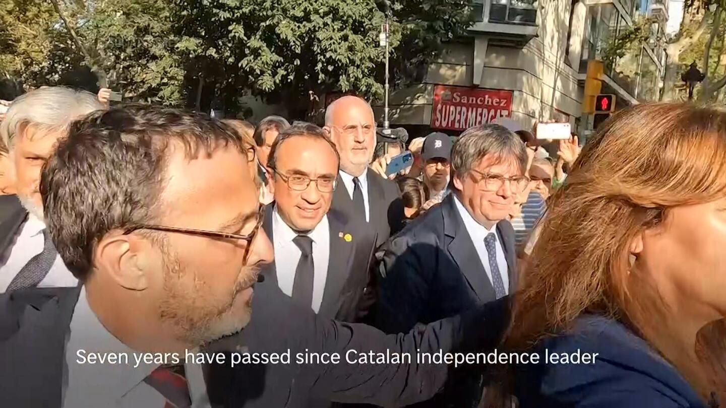 AP photographer on how ex-Catalan leader returned to Spain, and then fled again after 7 years abroad | AP News