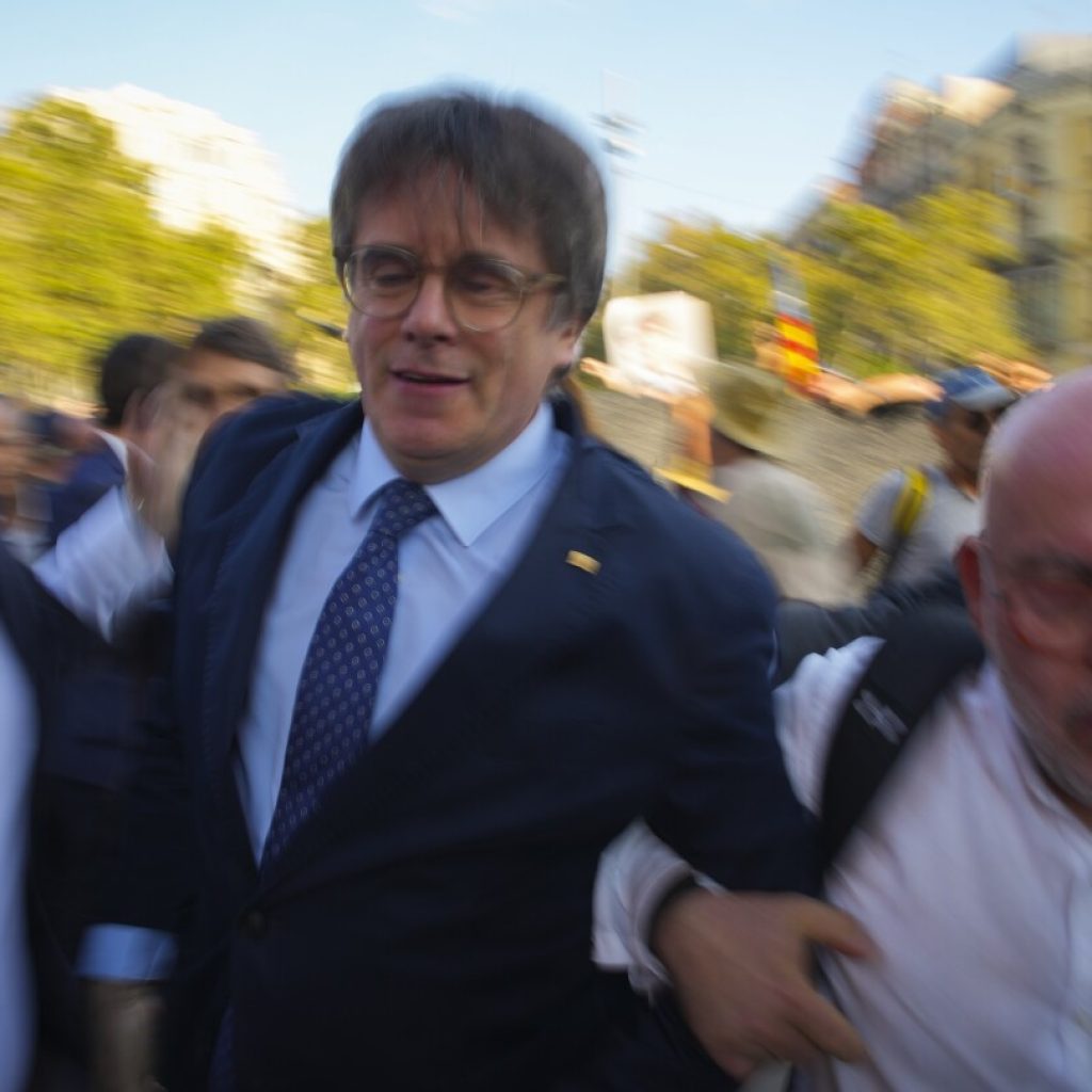 Fugitive ex-Catalan leader said to be in Belgium as Spanish police try to explain how he escaped