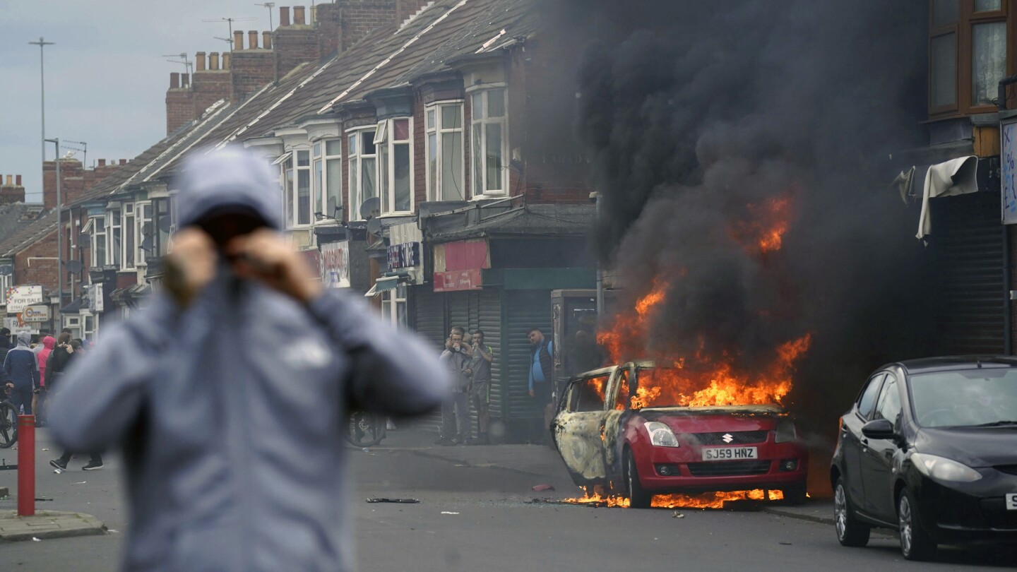 Man who encouraged torching hotels for asylum seekers in Britain gets 3 years in prison