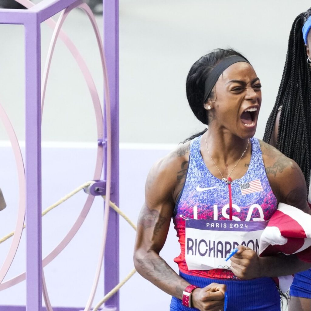 Sha’Carri Richardson chases down 2 competitors in rain to end her first Olympics with a relay gold