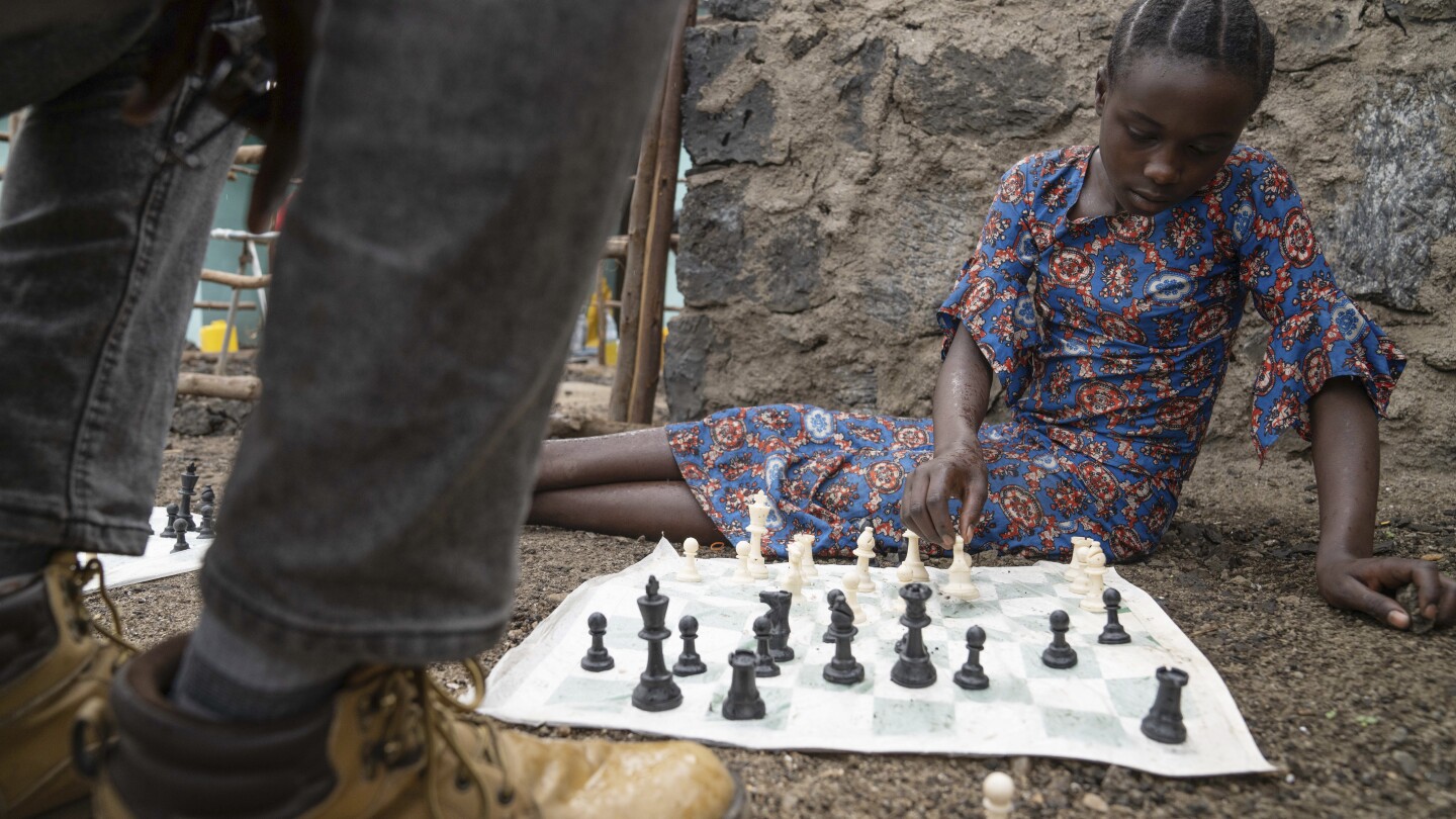 A chess club for kids thrives in a Congo refugee camp. It’s about more than the game