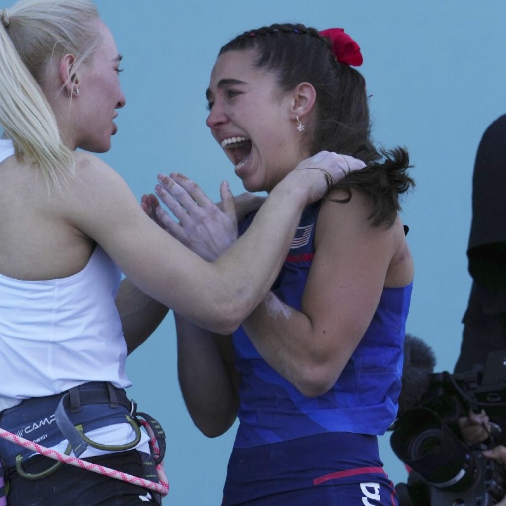 Janja Garnbret overcomes American Brooke Raboutou to defend Olympic gold medal in sport climbing