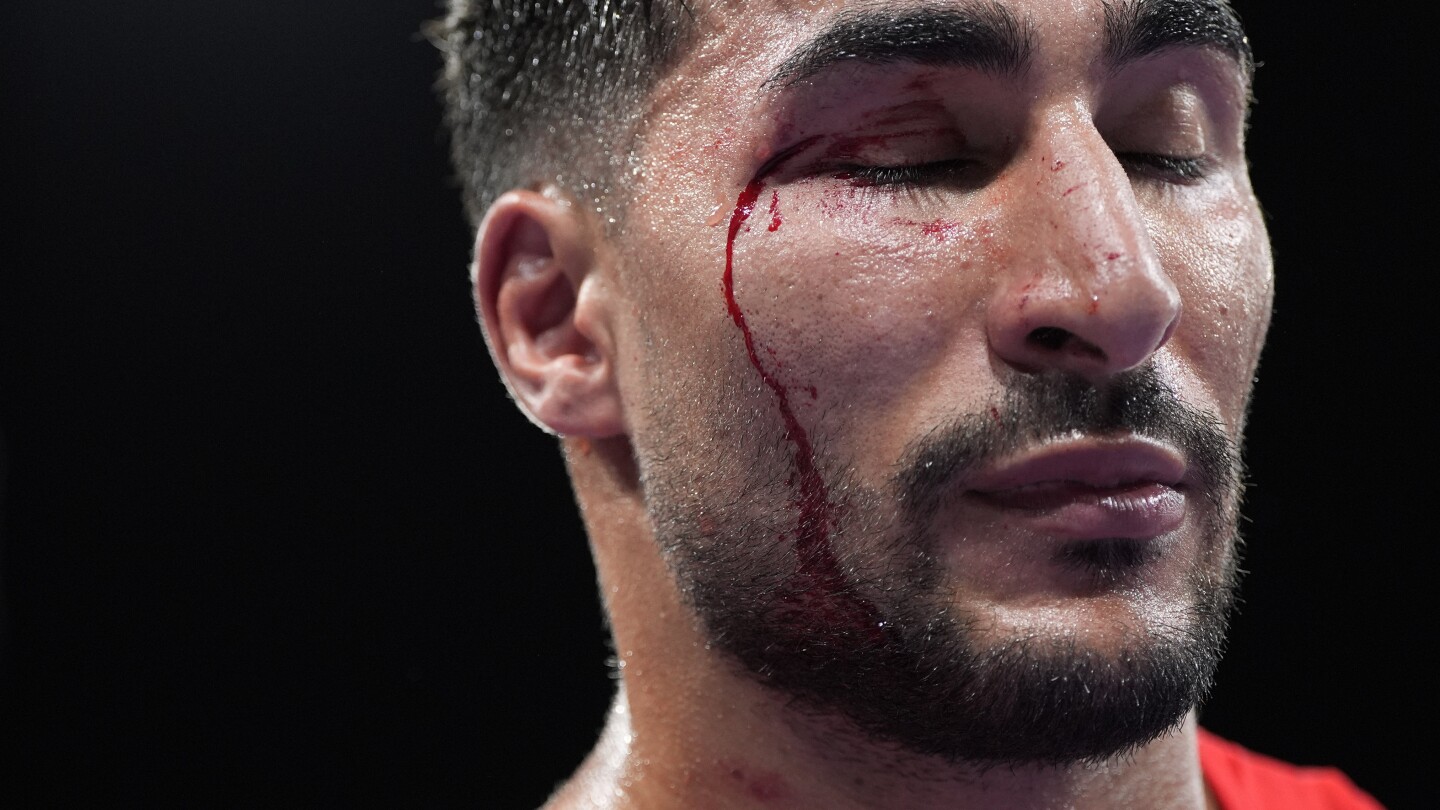 AP PHOTOS: Athletes across the Paris Games sustain bloody injuries during competition