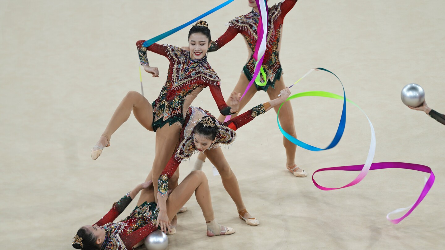 China becomes first non-European country to claim Olympic gold in rhythmic gymnastics