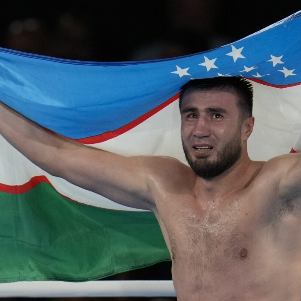 After coach’s life was likely saved backstage, Uzbekistan dominates Olympic boxing tournament