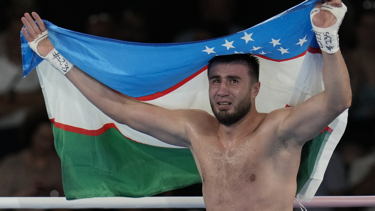 After coach’s life was likely saved backstage, Uzbekistan dominates Olympic boxing tournament